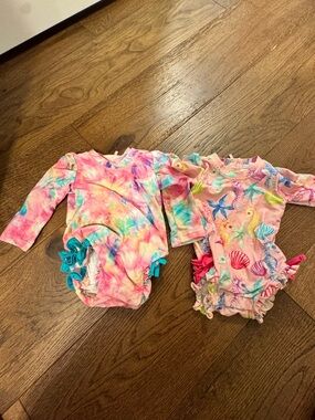 Posh Peanut Pink Tie-Dye Ruffle One-Piece; Seashore One-piece